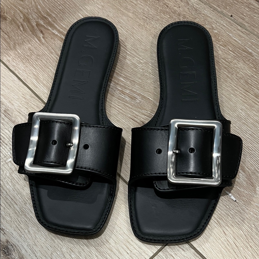 M. Gemi The Opanca Black Leather Slide Sandals with Silver Buckle